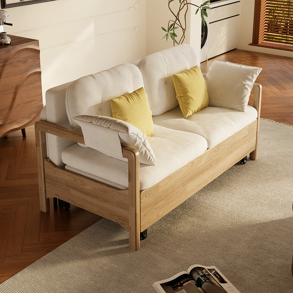 Side view of fabric sofa bed with spacious storage area revealed