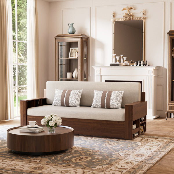 Alternate angle of sofa bed with accessories like pillows and throw blankets