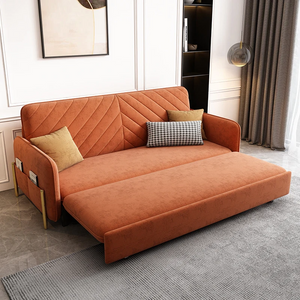 Close-up of sofa bed’s velvet upholstery and tufted seat design